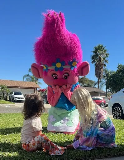 Pink Troll party character in Nashville